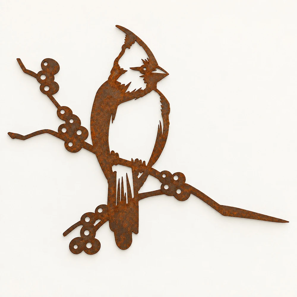 Rusted steel cardinal perched on a berry branch