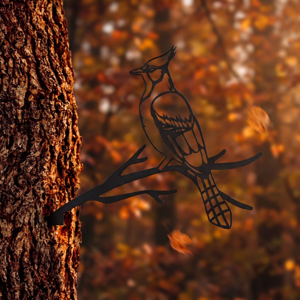 A reminder of the blue jay meaning: the Blue Jay Stake in Black on an autumn tree