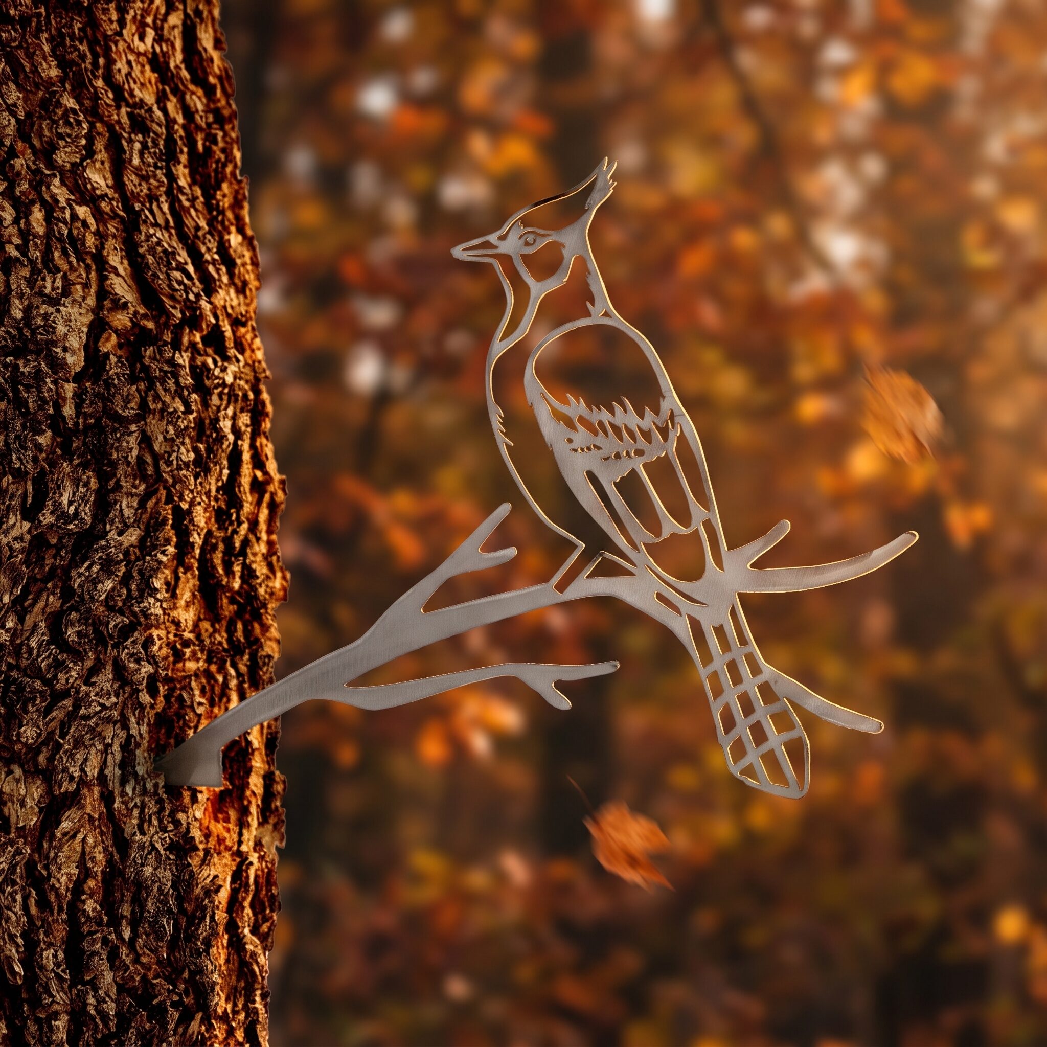 Blue Jay Stake metal yard art in raw steel finish, autumn setting