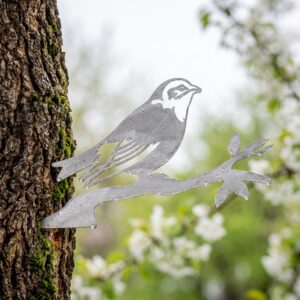Finch Stake metal yard art in raw steel finish, spring setting