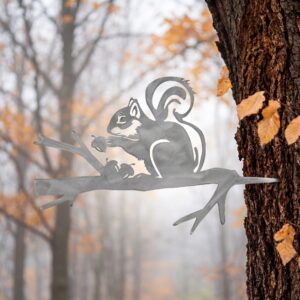 Squirrel Stake metal yard art in raw steel finish, autumn setting